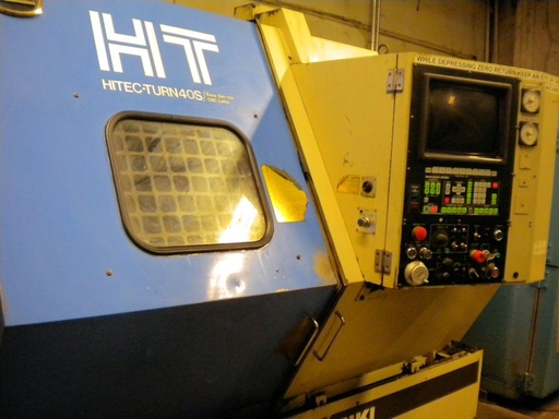 HITACHI SEIKI HT 40S, YASNAC CNC/CRT, 18 Chk, 4 SP BORE,40 HP,TAILTOCK,50 .1988