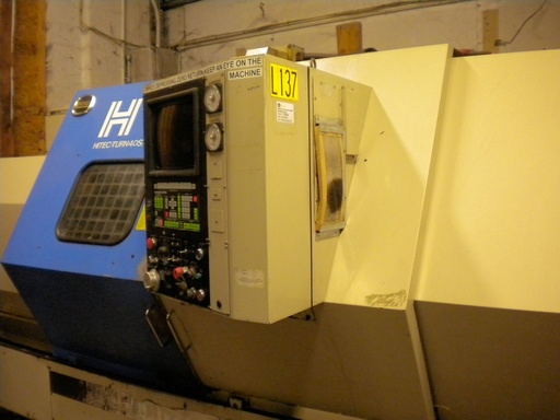 HITACHI SEIKI HT 40S, YASNAC CNC/CRT, 18 Chk, 4 SP BORE,40 HP,TAILTOCK,50 .1988