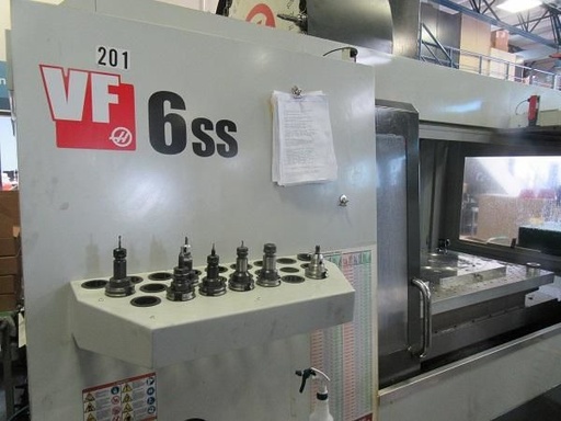 64 X, 32 Y, 30 Z, HAAS VF6SS,12,000 RPM,30 HP,CT 40,SIDE MOUNT ATC,CHIP, 2014